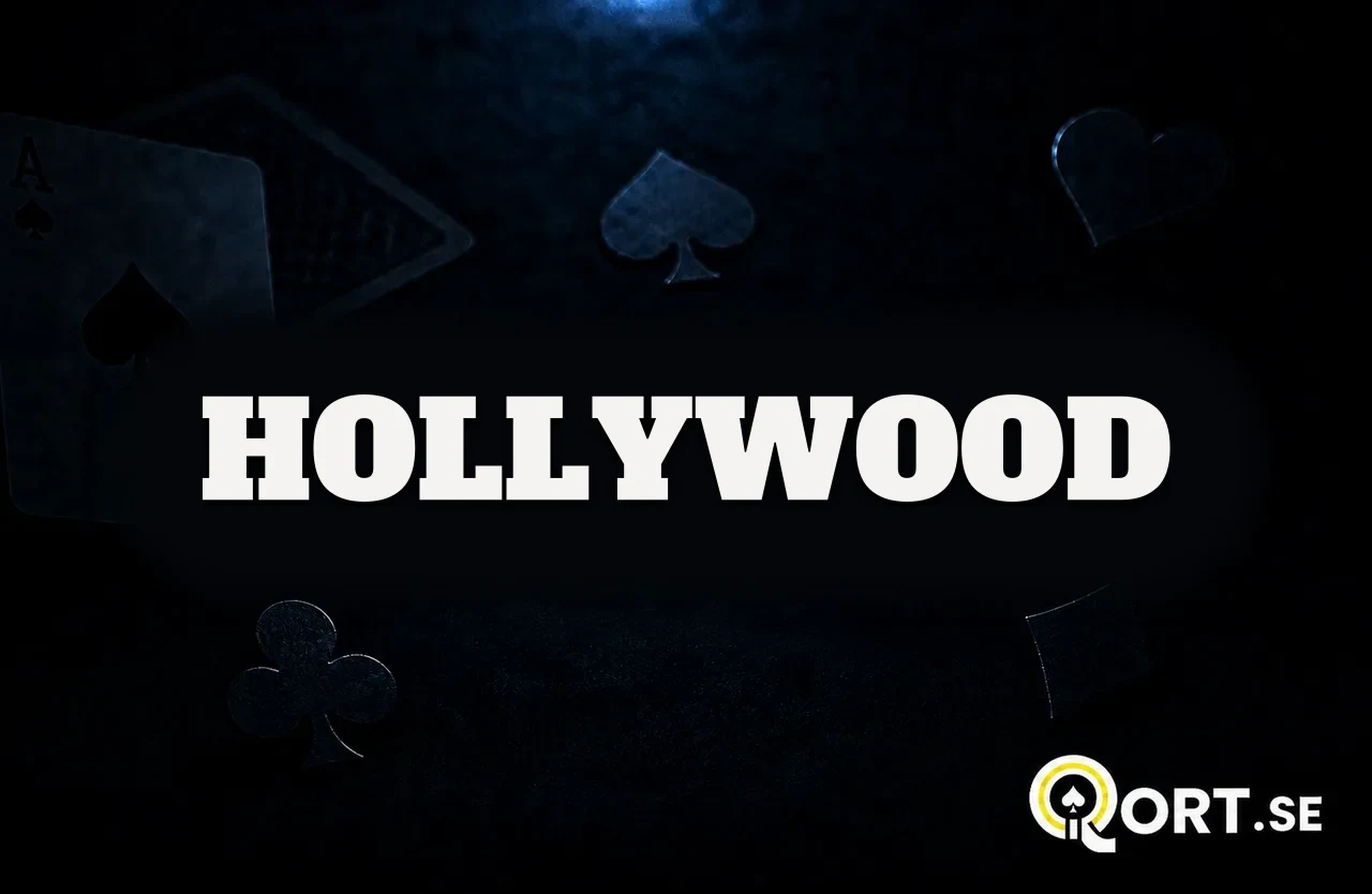 Mörkt kortbord med spelkort och färgsymboler och namnet Hollywood